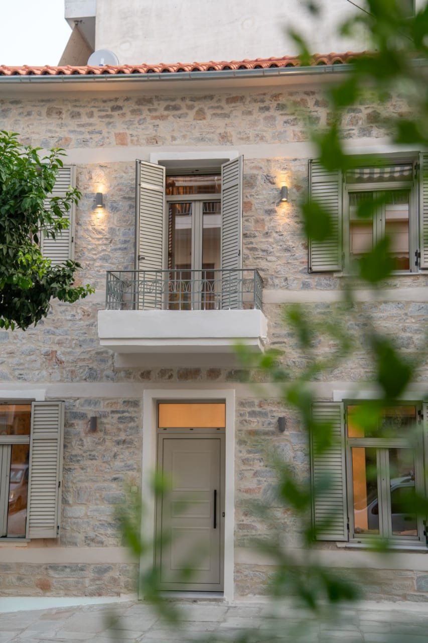 The façade through the foliage