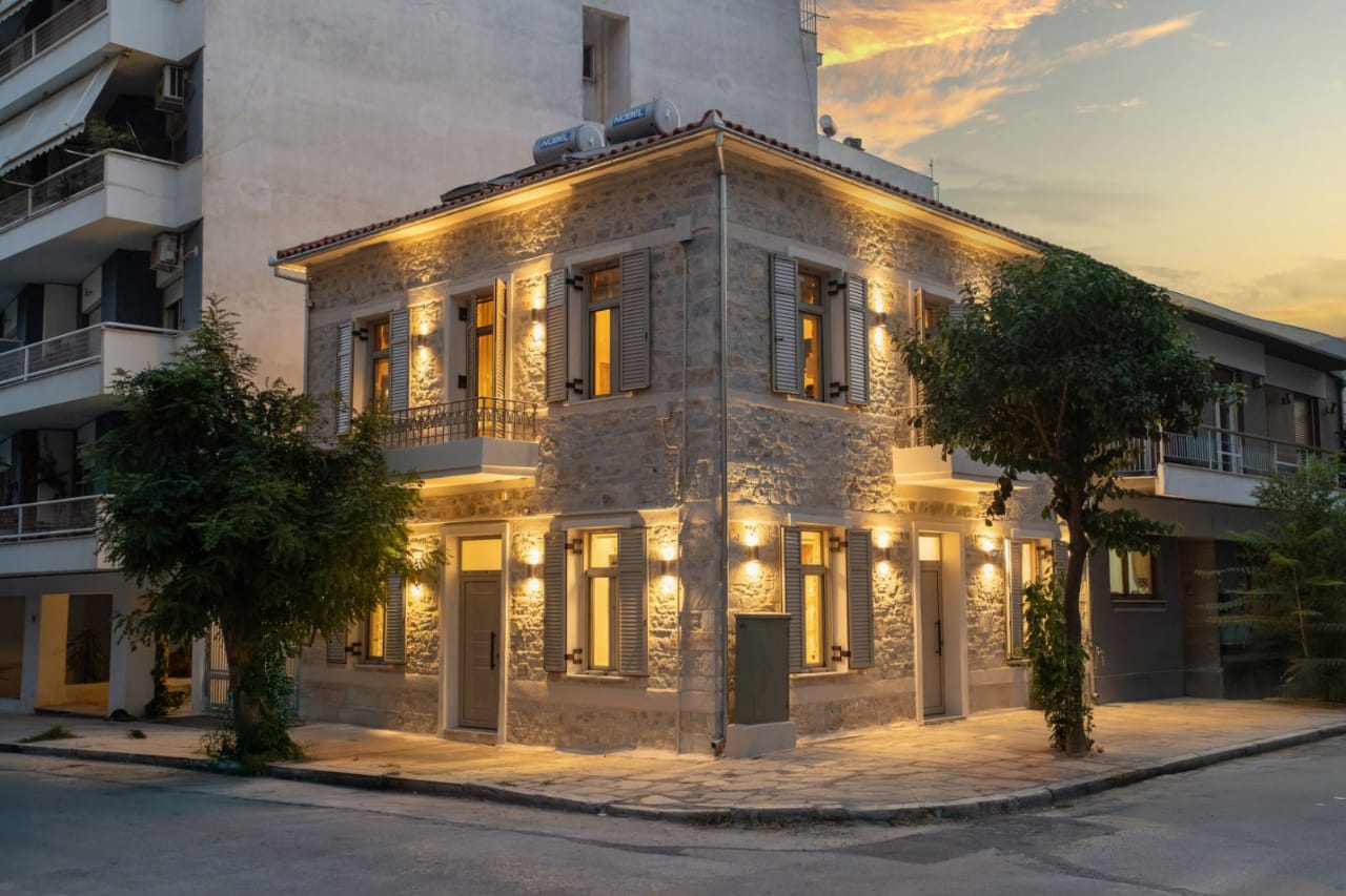 The Stone House in Volos at dusk
